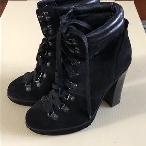 Black suede lace ups by Coach
